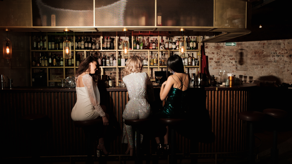 A dark bar to get a drink in after a concert in Charlotte.